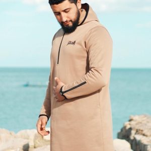 قميص المُعَتَزْ الذهبي